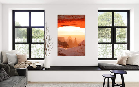 A Mesa Arch picture at sunrise from this hike in Canyonlands National Park hangs in a living room.