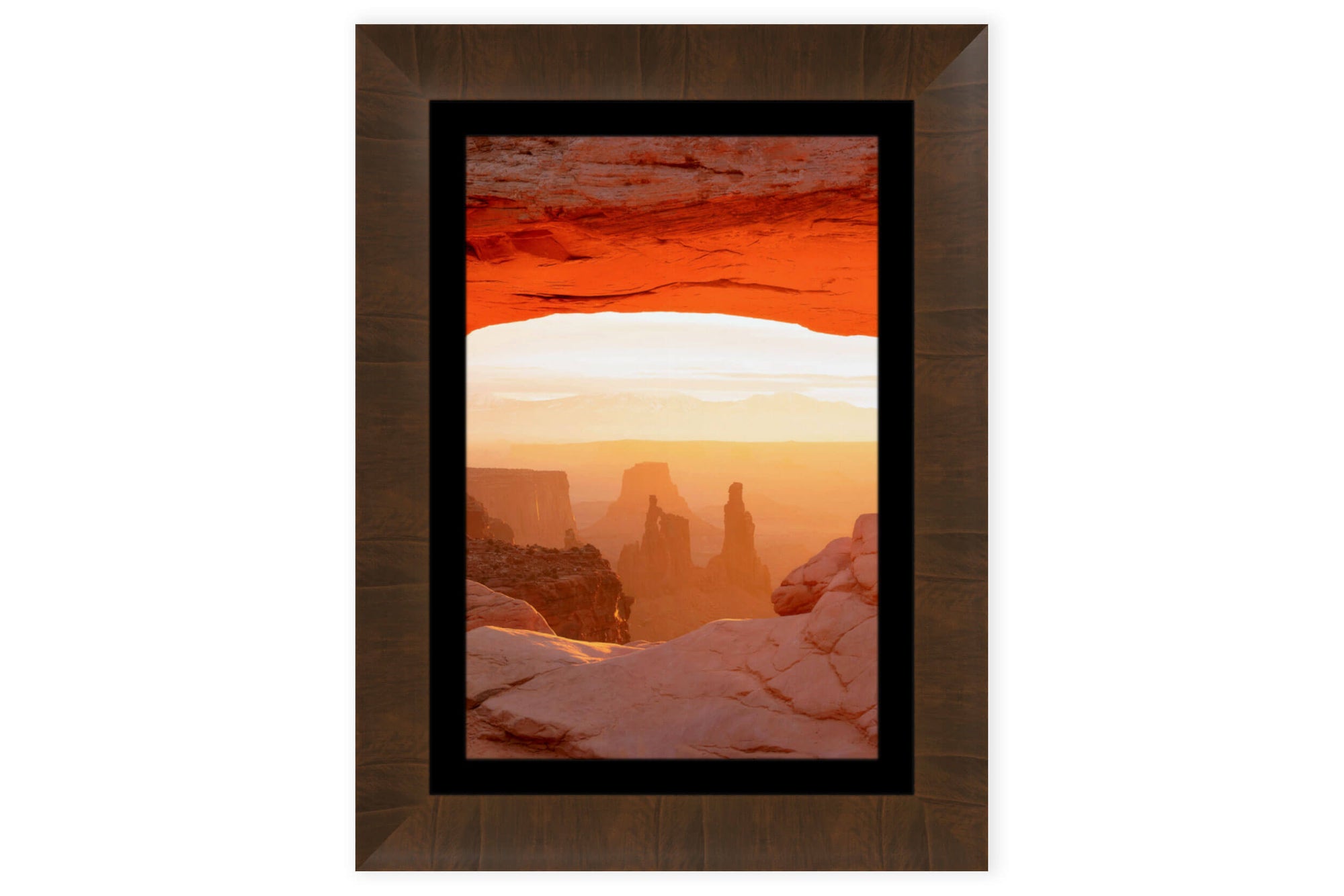A framed Mesa Arch picture at sunrise from this hike in Canyonlands National Park in Utah.