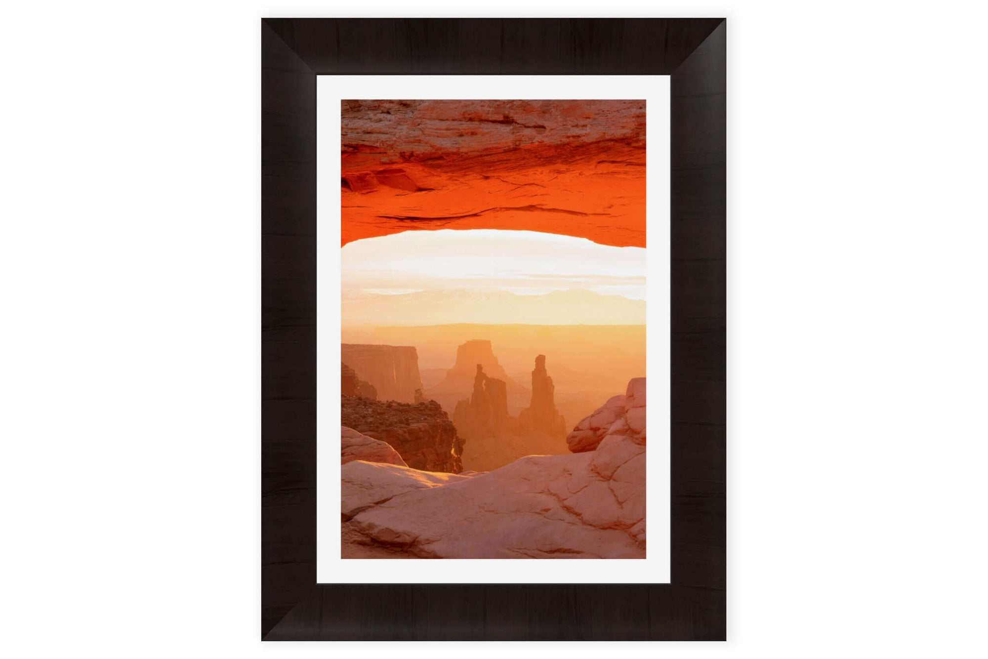 A framed Mesa Arch picture at sunrise from this hike in Canyonlands National Park in Utah.