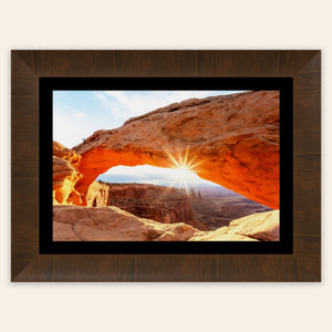 A piece of framed Moab art showing Mesa Arch in Canyonlands National Park.