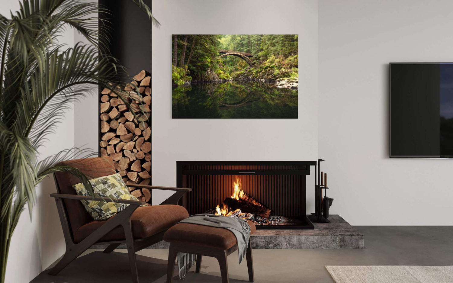 A Moulton Falls picture showing the first fall colors hangs in a living room.
