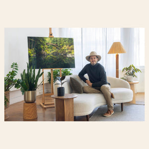 West Seattle artist Lars Gesing with his Moulton Falls photo.