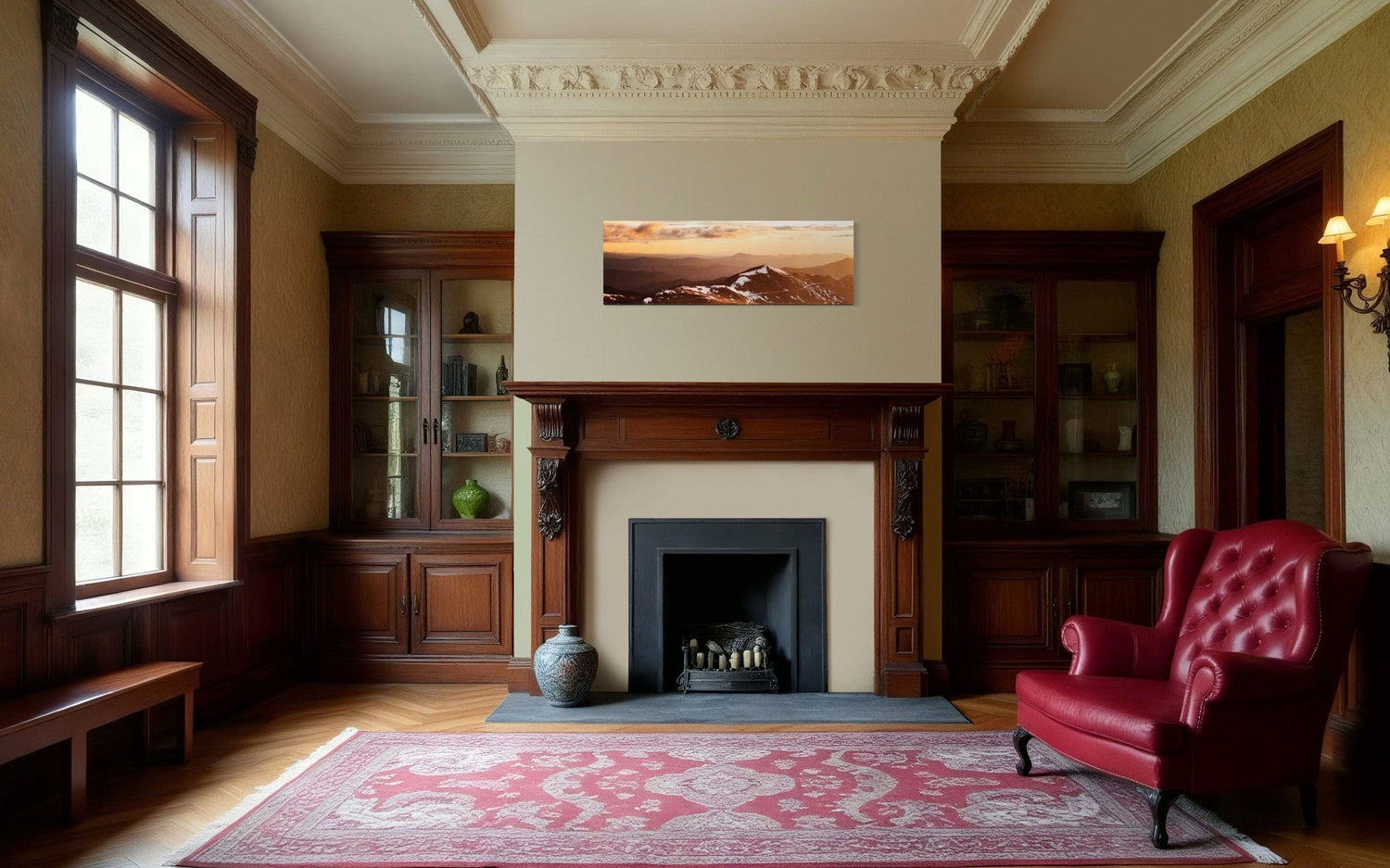 A piece of Colorado art showing a photo of Mount Evans at sunrise hangs above a fireplace mantel.