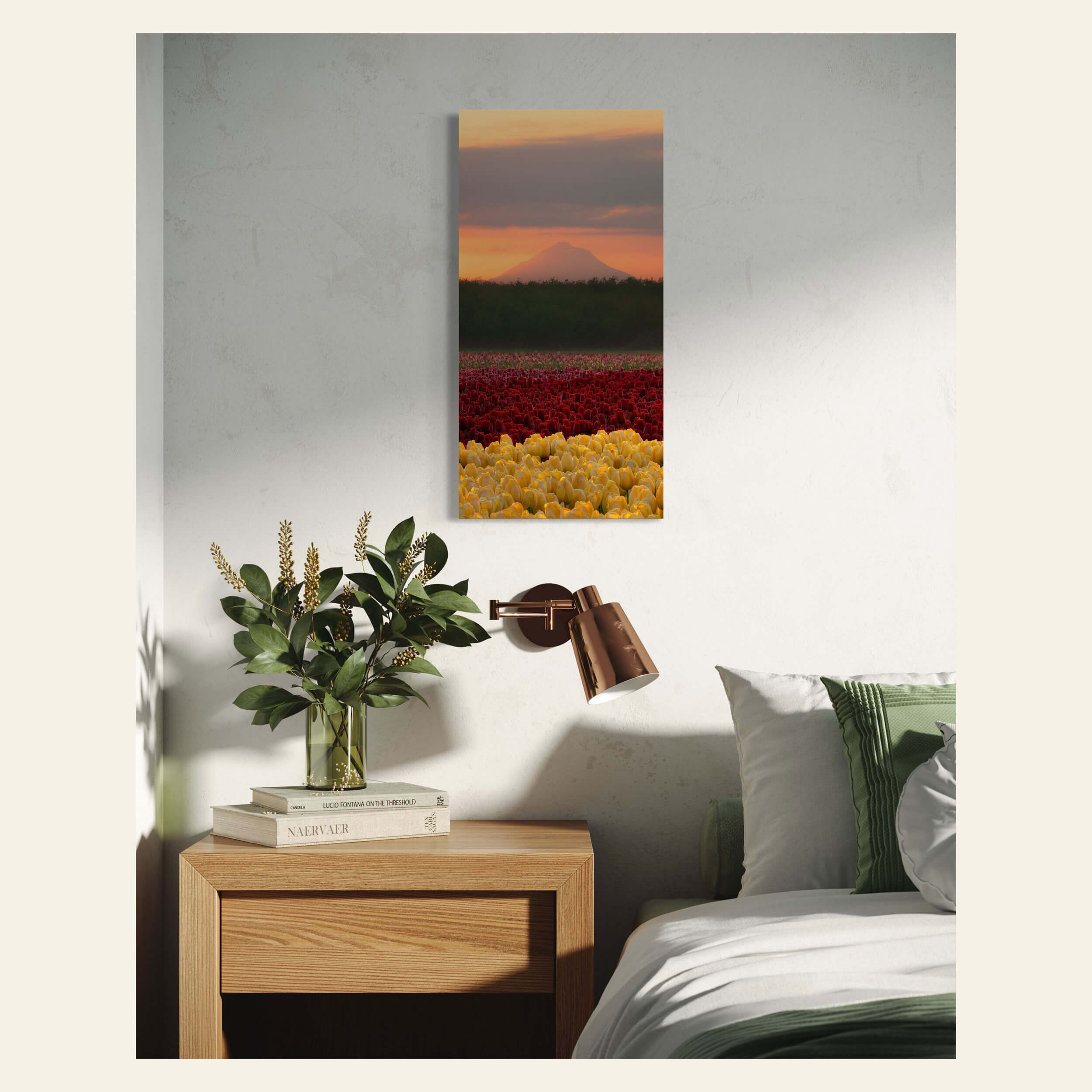 A sunrise picture from Wooden Shoe Tulip Farm hangs in a bedroom.