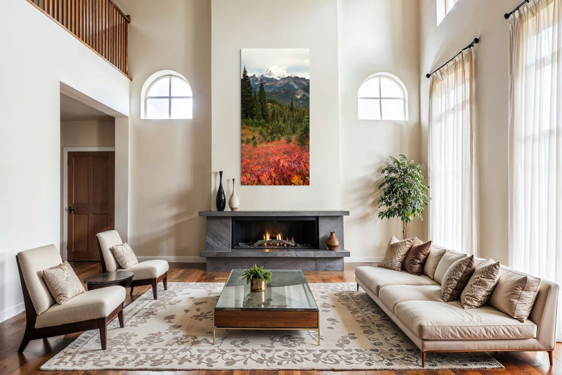 A piece of Mount Rainier artwork by West Seattle artist Lars Gesing hangs above a fireplace.