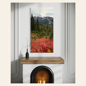 This piece of Seattle wall art showing the Mount Rainier fall colors hangs over a fireplace.