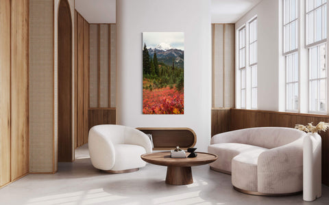 A piece of Seattle art showing the Mount Rainier fall colors hangs in a living room.