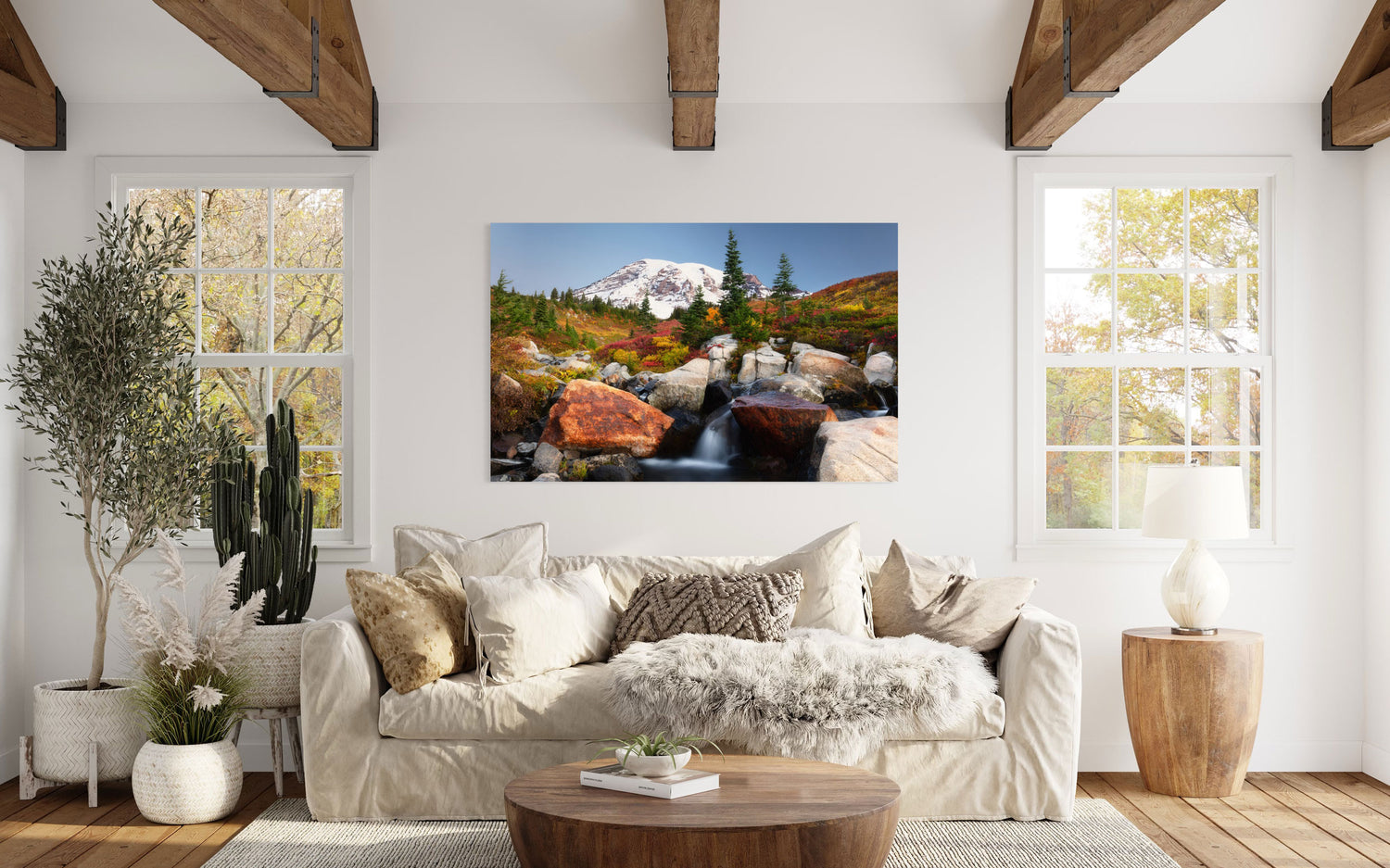 A piece of Mount Rainier wall art showing the fall colors at Paradise hangs in a living room.