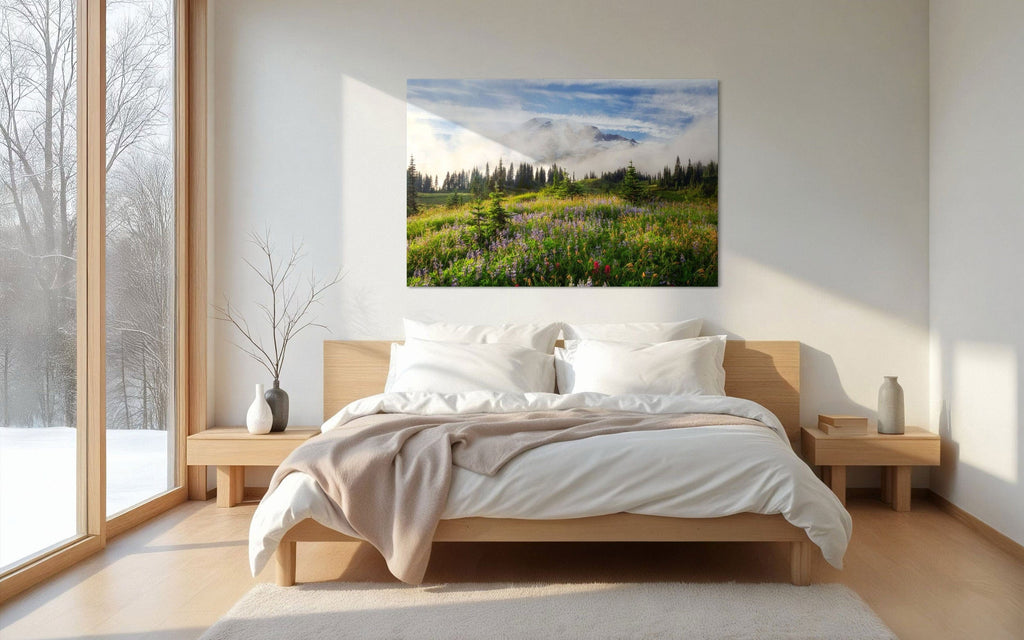 A piece of Mount Rainier art showing a wildflower photo at Paradise hangs in a bedroom.