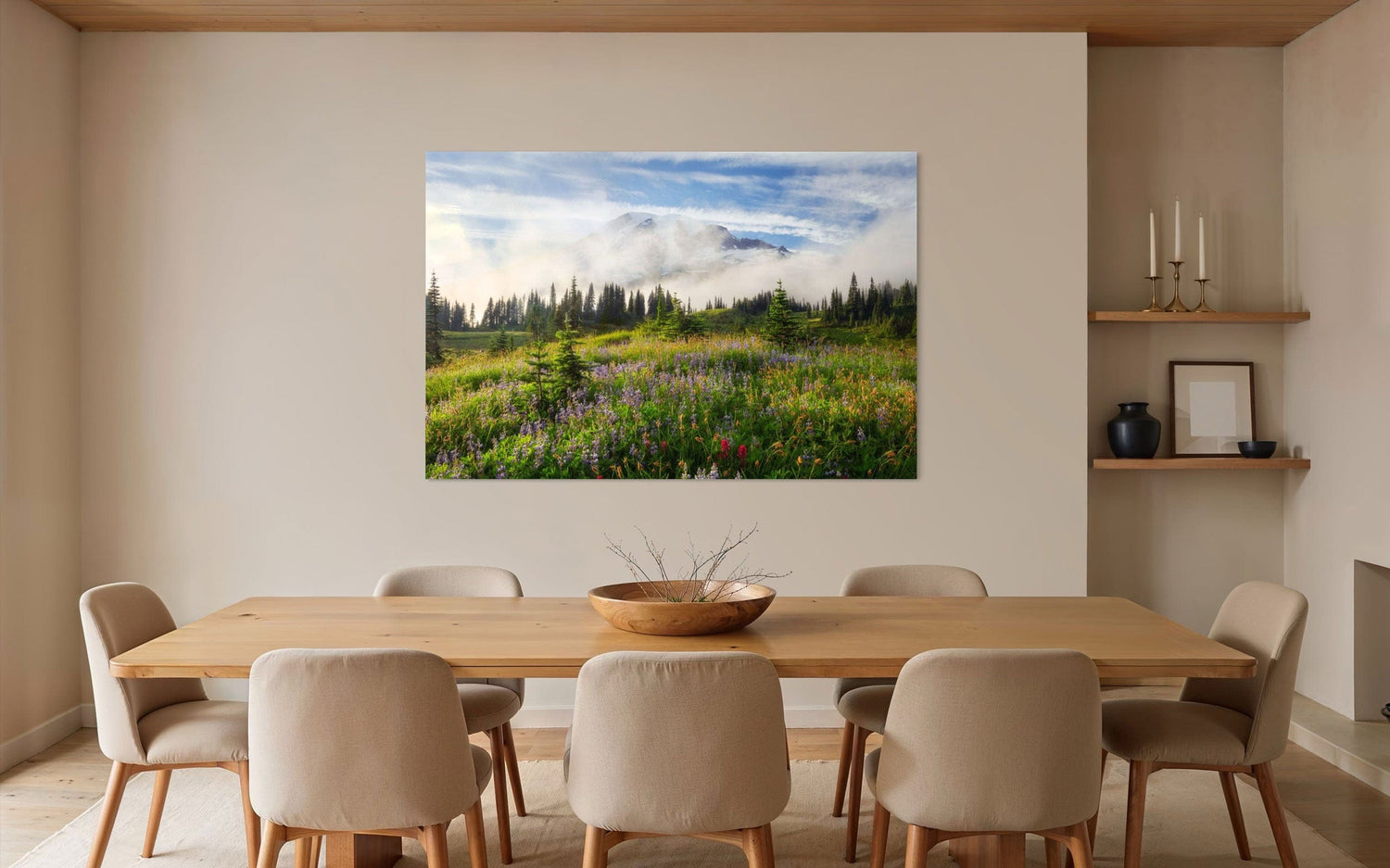 A piece of Mount Rainier art showing a wildflower photo at Paradise hangs in a dining area.