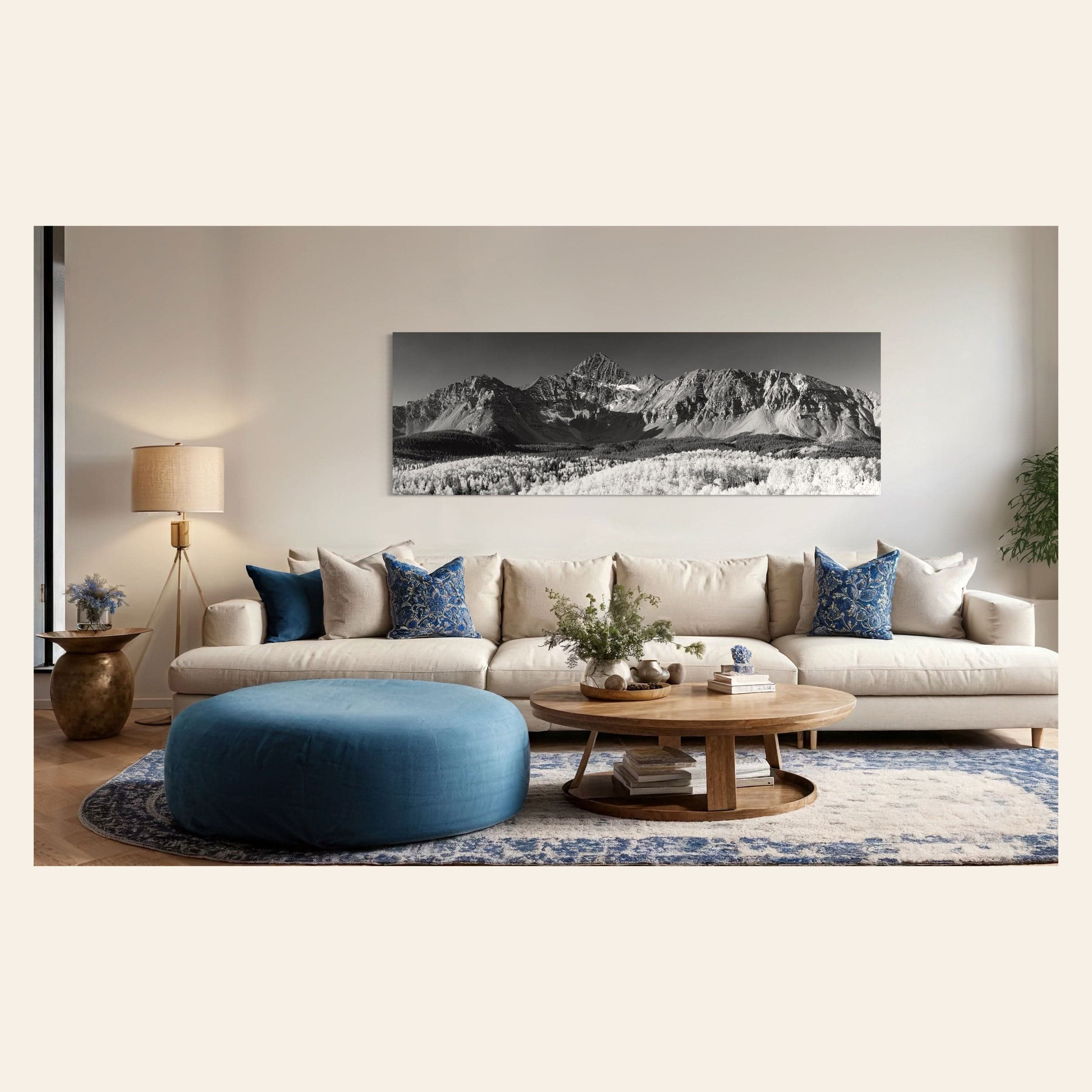 A piece of Telluride art showing a black and white photography print of Mount Wilson hangs in a living room.