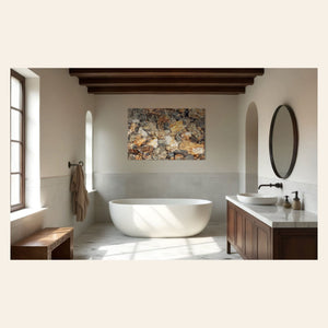 A piece of Telluride art showing a photo of a Colorado mountain stream hangs in a beautiful bathroom.