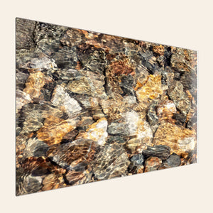 A piece of TruLife acrylic Telluride art shows a photo of a Colorado mountain stream.