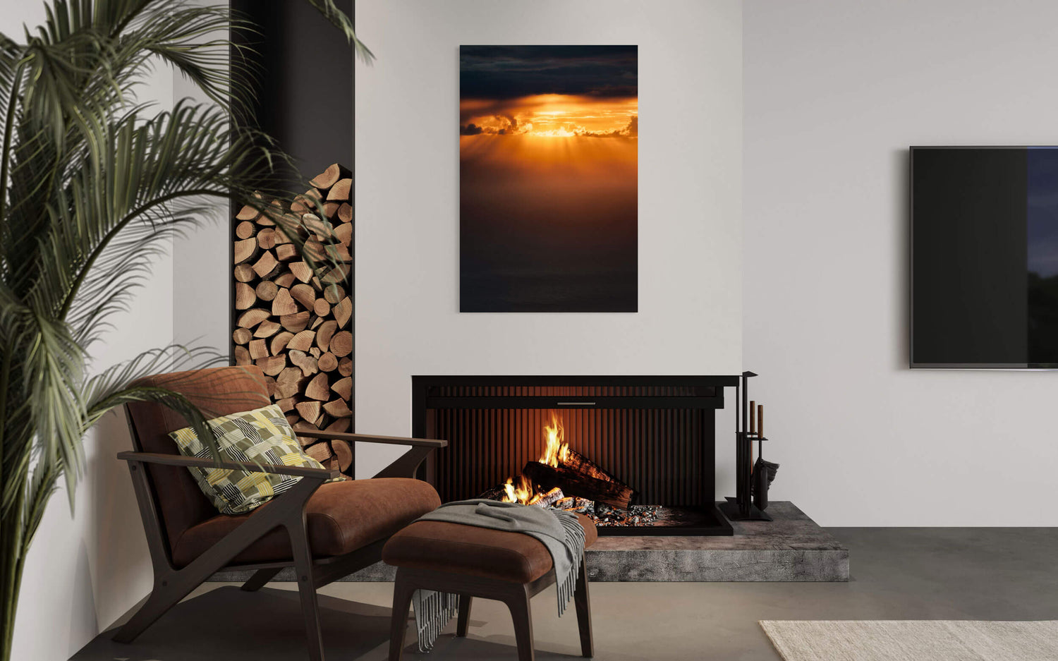 A sunset picture from the Napali Coast on Kauai hangs in a living room.