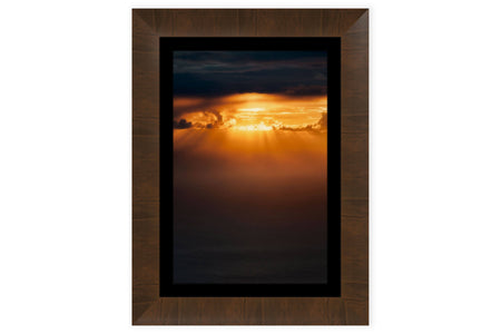 A framed sunset picture from the Napali Coast on Kauai.