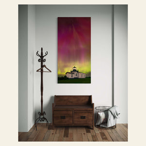 A Washington Northern Lights photography print hangs in an entryway.