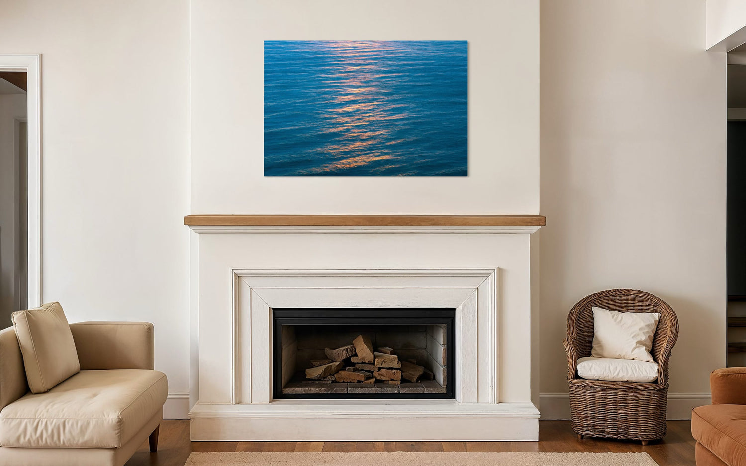 An ocean sunset photo hangs above a fireplace. | Lars Gesing Fine Art | Coastal Wall Art