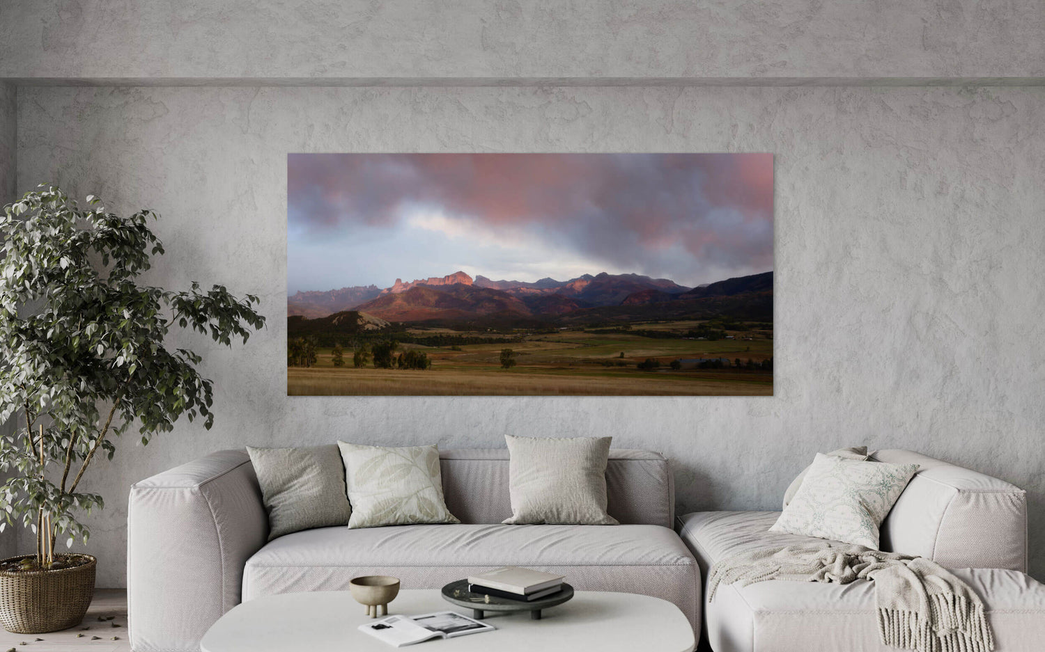 An Owl Creek Pass picture at sunset in Ridgway, Colorado, hangs in a living room.