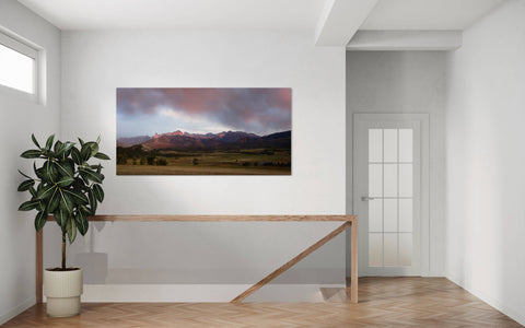 An Owl Creek Pass picture at sunset in Ridgway, Colorado, hangs in an entryway.