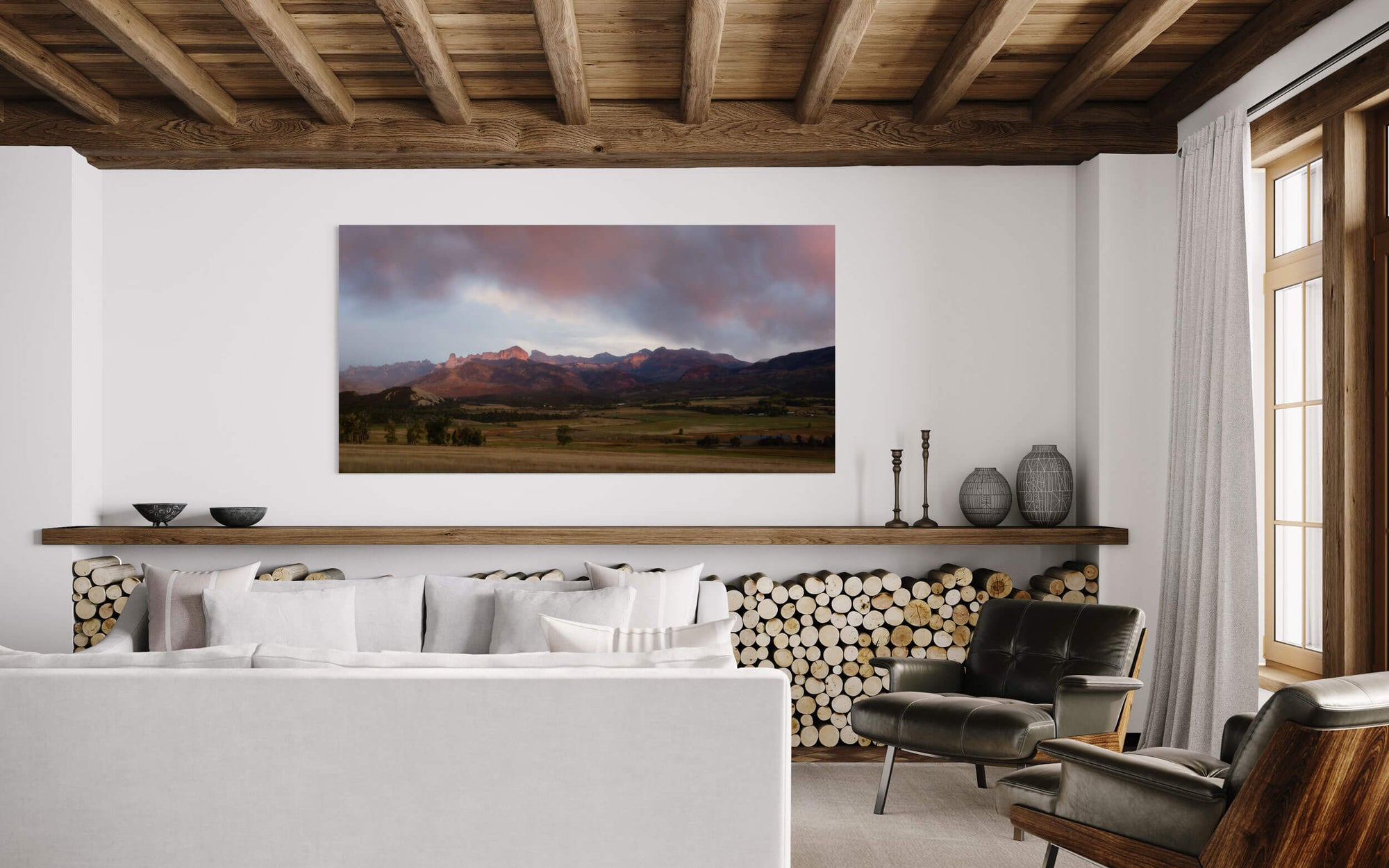 An Owl Creek Pass picture at sunset in Ridgway, Colorado, hangs in a living room.