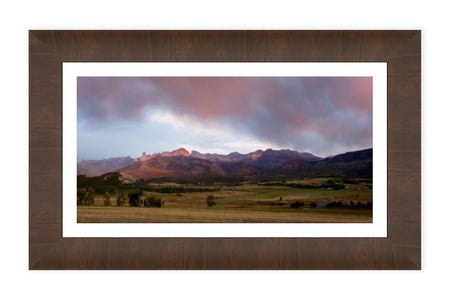 A framed Owl Creek Pass picture at sunset in Ridgway, Colorado.