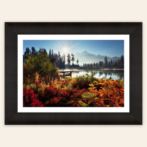 A piece of framed Washington art showing Picture Lake near Mount Baker.