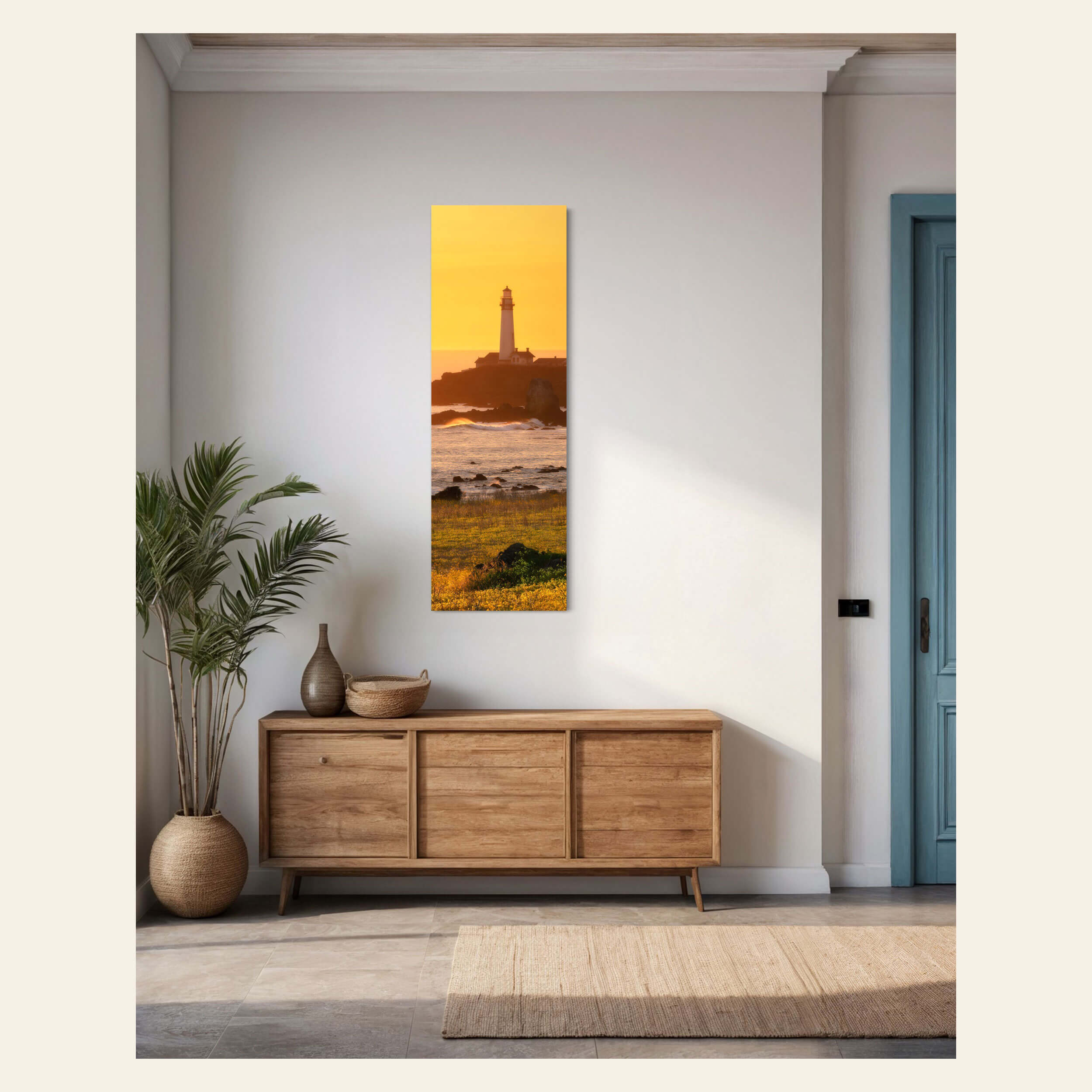 A sunset picture from Pigeon Point Lighthouse in California hangs in an entryway.
