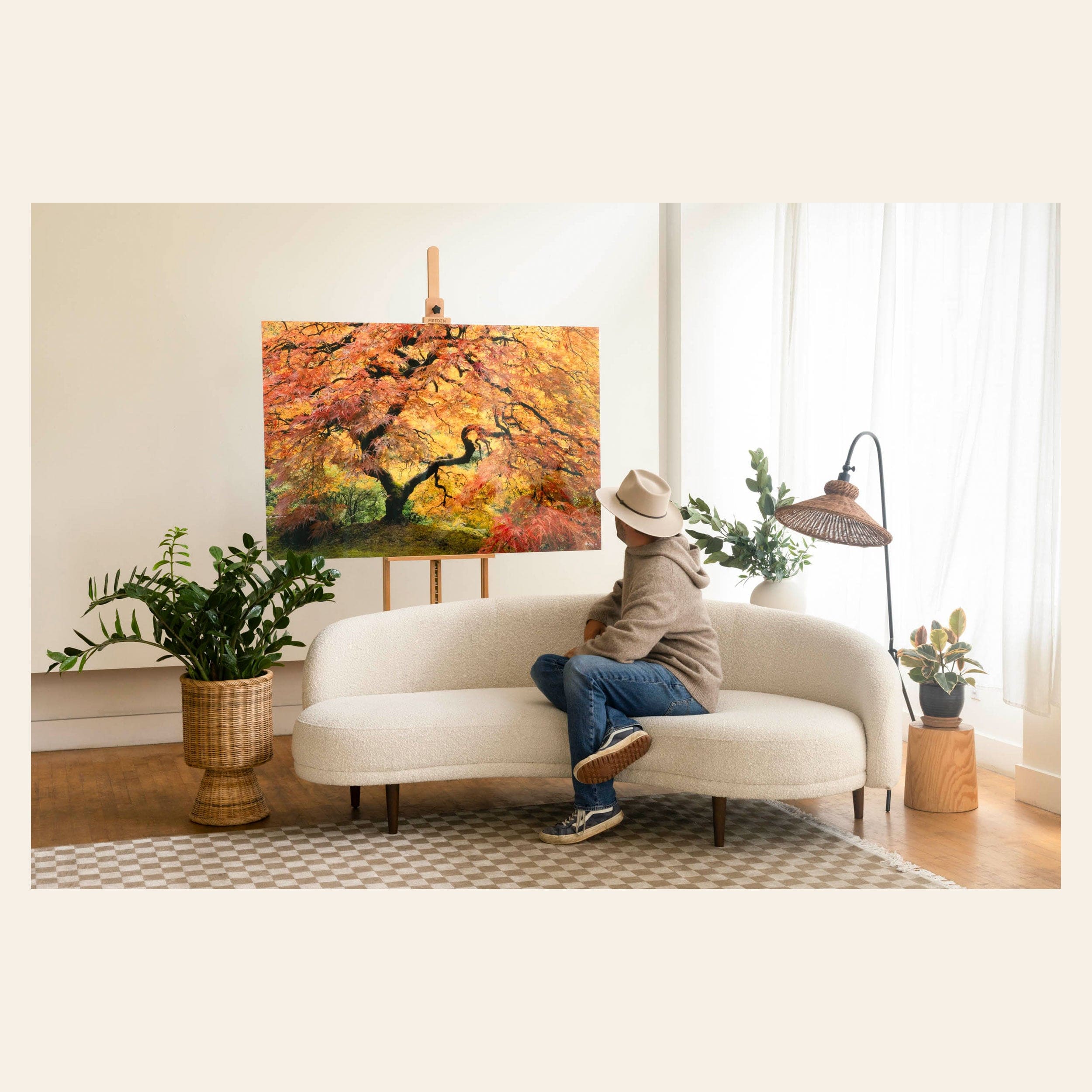 West Seattle artist Lars Gesing with his Japanese maple artwork.