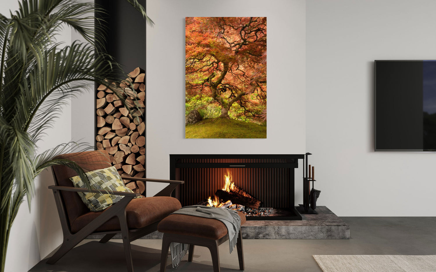 A piece of Japanese wall art showing the maple tree in the Portland Japanese Garden hangs in a living room.