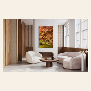 A piece of Japanese wall art showing the maple tree in the Portland Japanese Garden hangs in a living room.