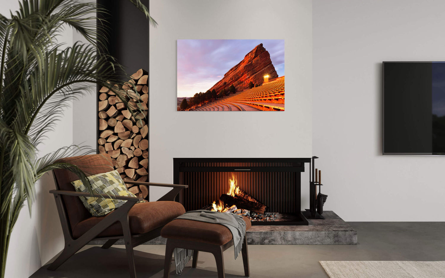 A Red Rocks Amphitheater picture from Denver, Colorado, hangs in a living room.