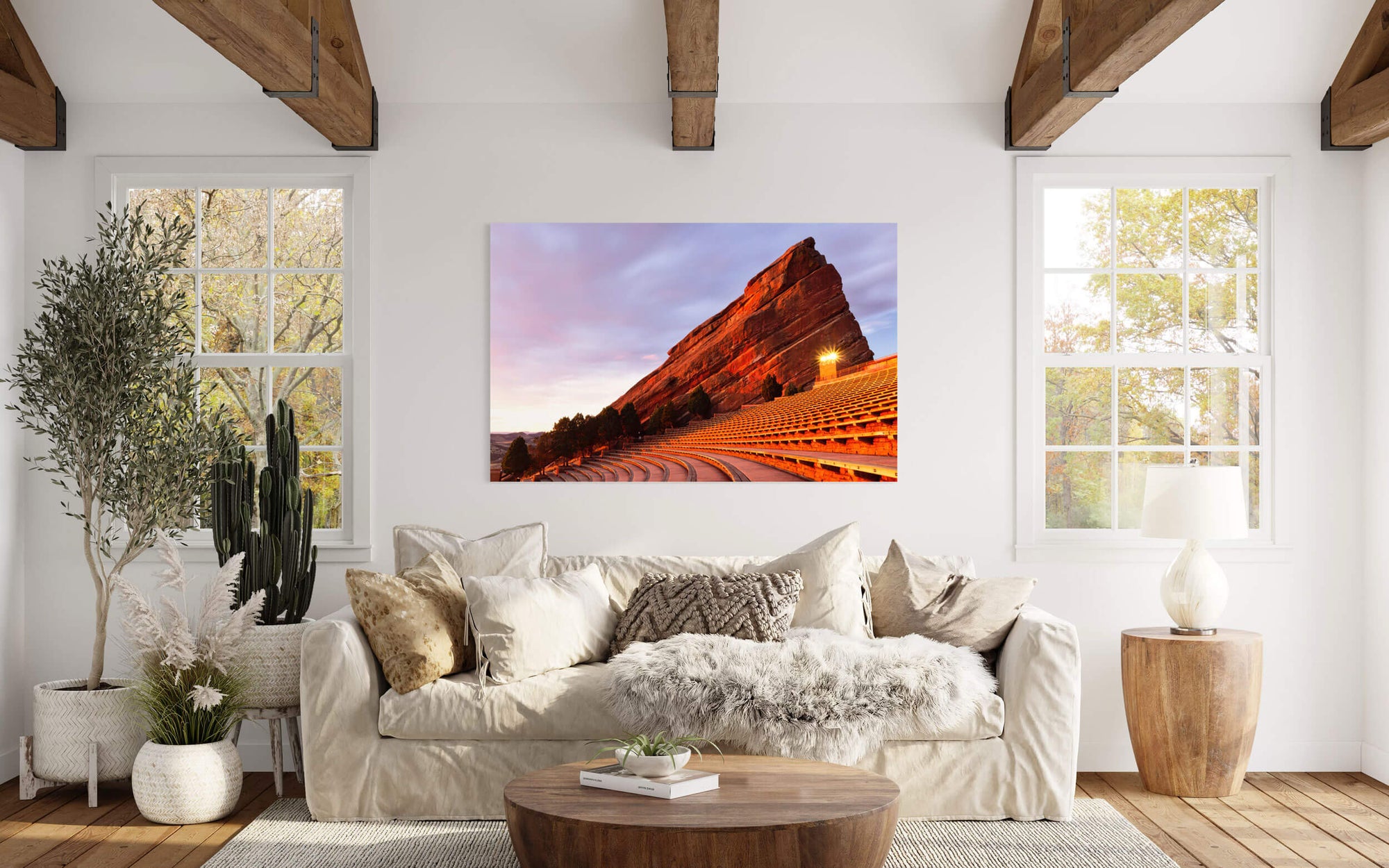 A Red Rocks Amphitheater picture from Denver, Colorado, hangs in a living room.