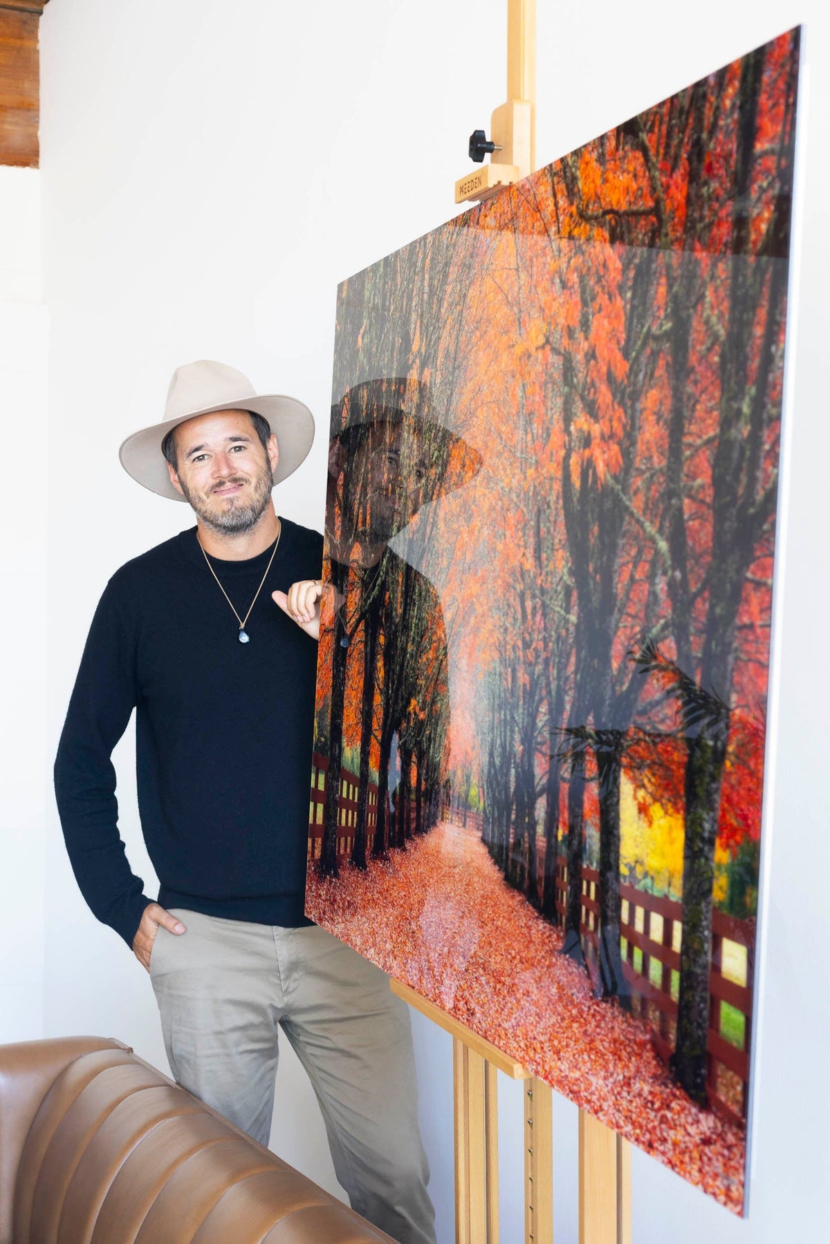 West Seattle artist Lars Gesing with his fine art photograph of the fall colors at Rockwood Farm.