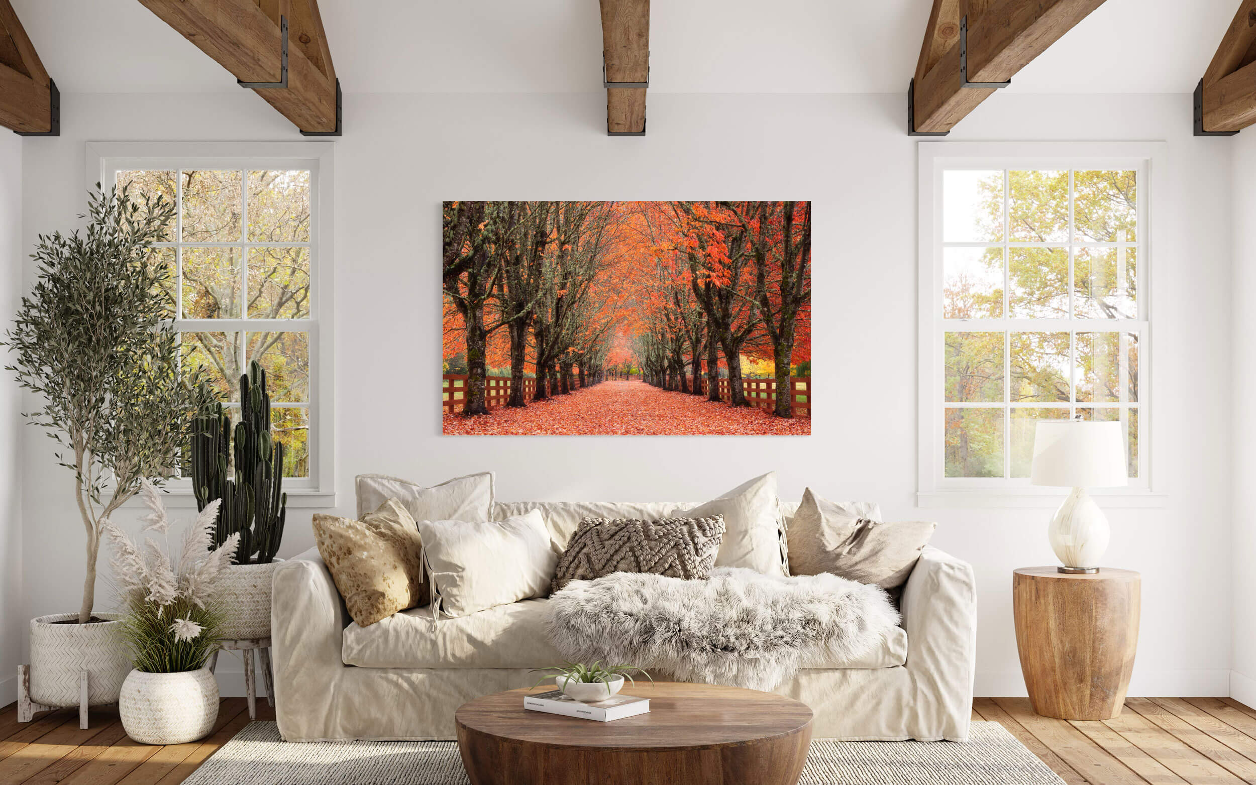 A piece of Seattle art showing fall at Rockwood Farm in Snoqualmie hangs in a living room.