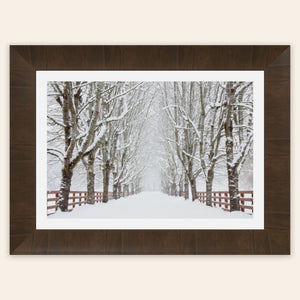 A piece of framed Seattle wall art shows Rockwood Farm in winter.