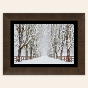 A piece of framed Seattle wall art shows Rockwood Farm in winter.