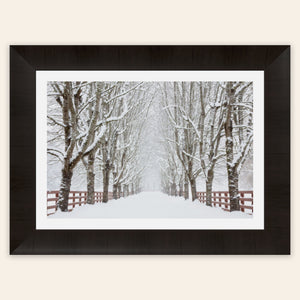 A piece of framed Seattle wall art shows Rockwood Farm in winter.