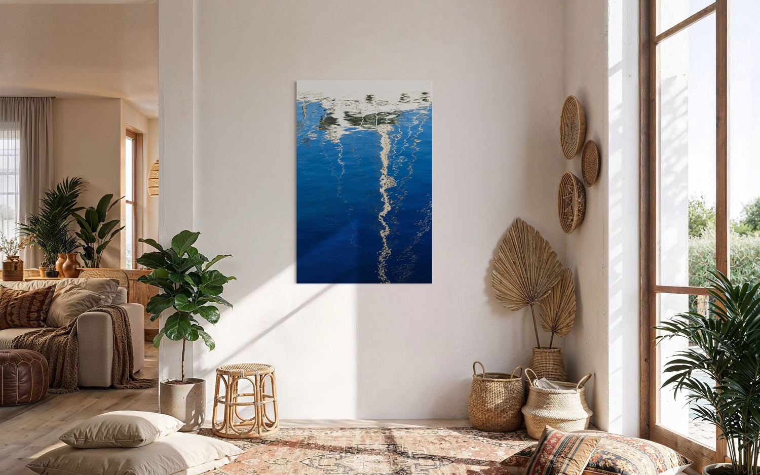 An abstract photo of a sailboat being reflected in the blue water of the San Francisco Marina hangs in a living area. | Lars Gesing Fine Art | Nautical Wall Art