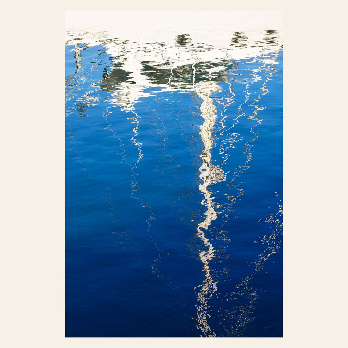 An abstract photo of a sailboat being reflected in the blue water of the San Francisco Marina. | Lars Gesing Fine Art | Nautical Wall Art