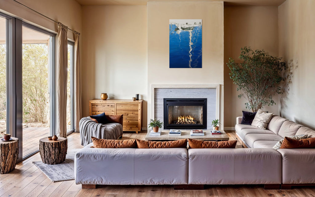 An abstract photo of a sailboat being reflected in the blue water of the San Francisco Marina hangs over a fireplace. | Lars Gesing Fine Art | Nautical Wall Art