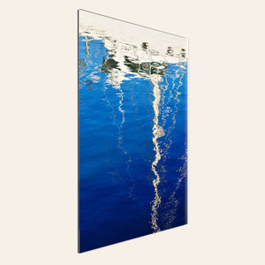 A TruLife acrylic abstract photo of a sailboat being reflected in the blue water of the San Francisco Marina | Lars Gesing Fine Art | Nautical Wall Art