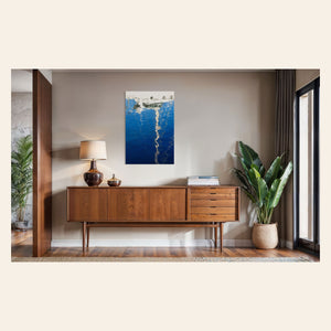 An abstract photo of a sailboat being reflected in the blue water of the San Francisco Marina hangs over a console. | Lars Gesing Fine Art | Nautical Wall Art