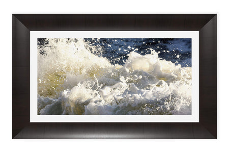 A framed Shark Fin Cove picture of waves near Big Sur, California.
