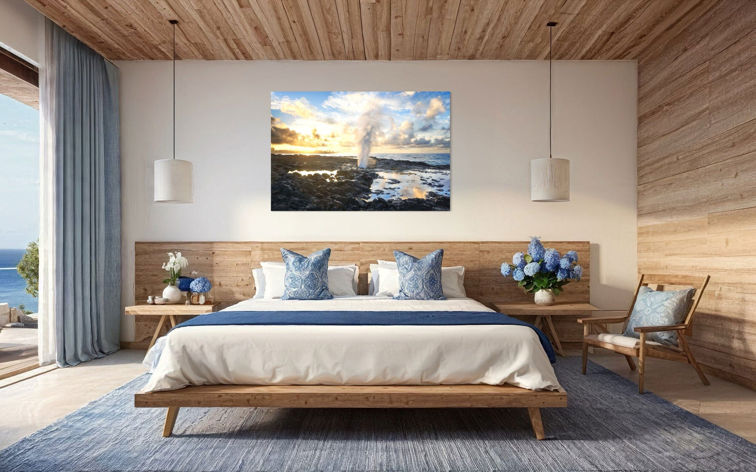 A piece of Kauai art showing a Spouting Horn photo hangs above a bed.