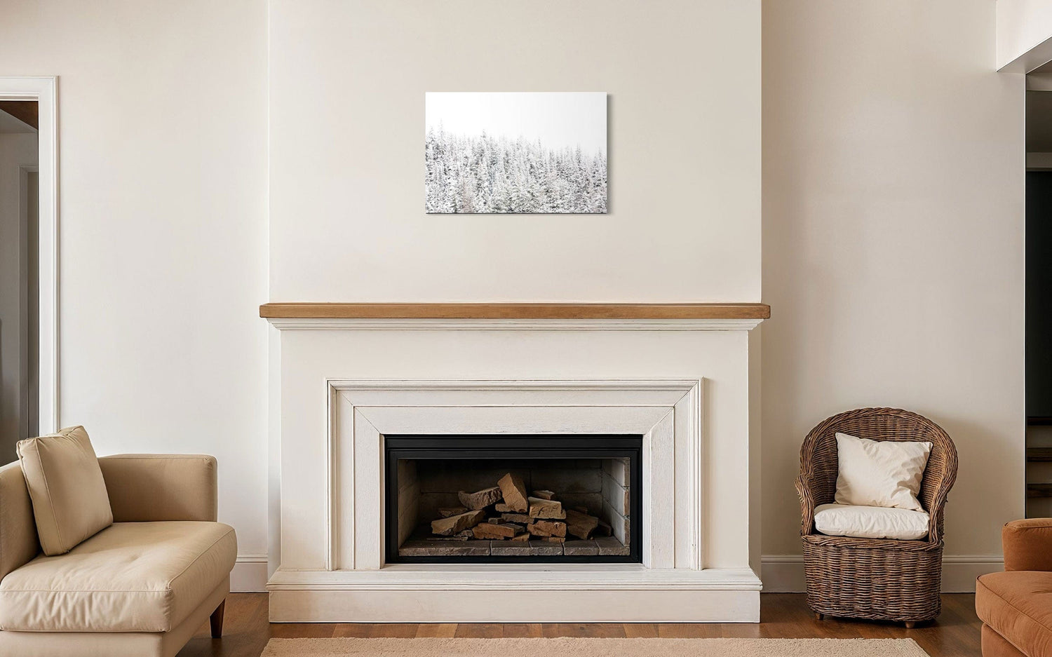 A piece of Steamboat Springs art showing snowy trees outside the Colorado ski resort hangs above a fireplace mantel.