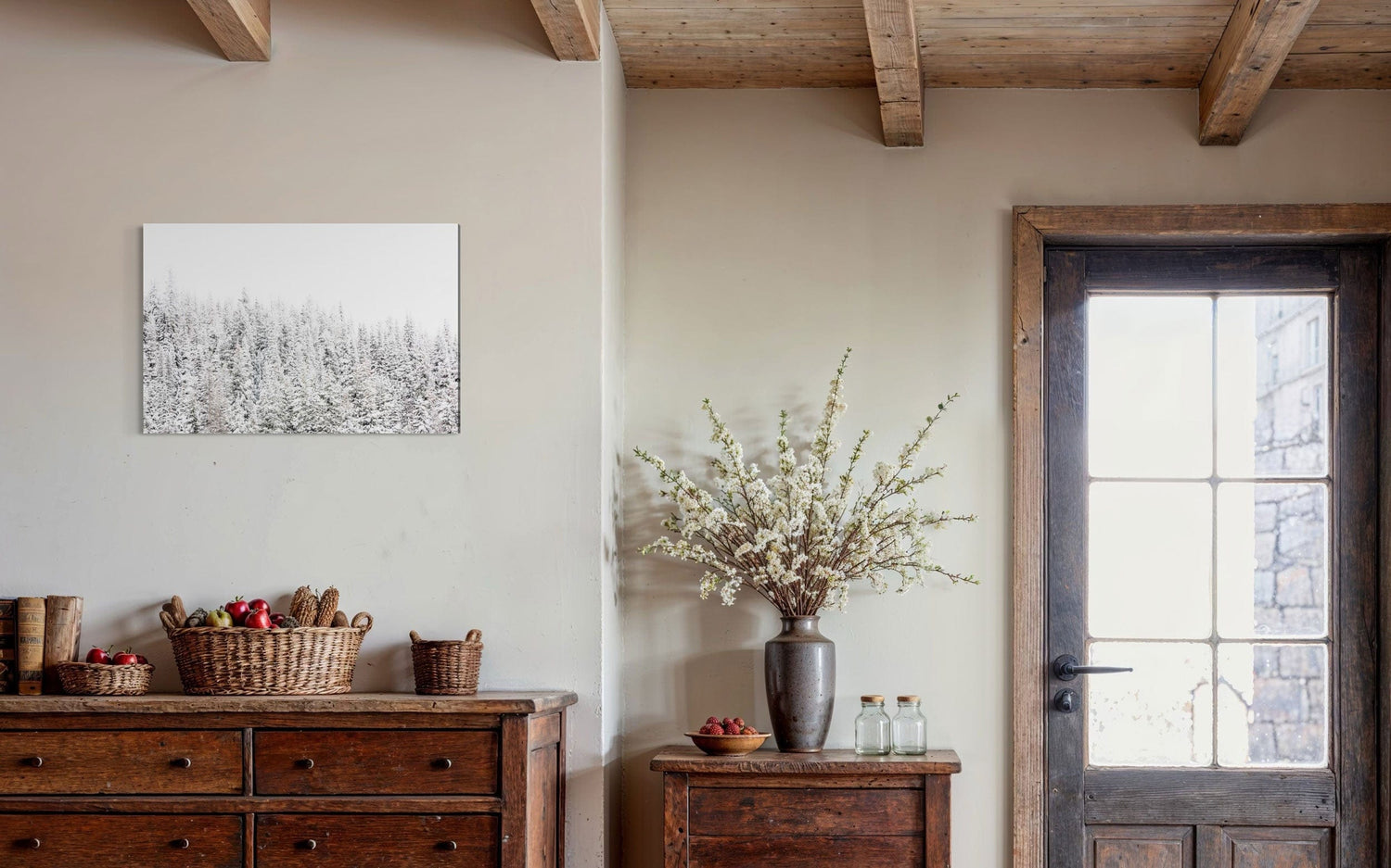 A piece of Steamboat Springs art showing snowy trees outside the Colorado ski resort hangs in an entryway.