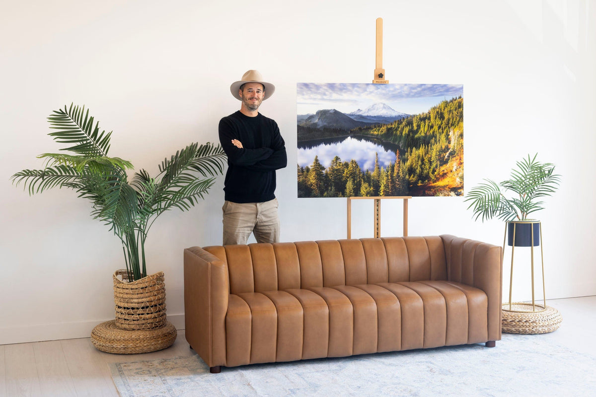 Seattle artist Lars Gesing with a piece of Mount Rainier art.