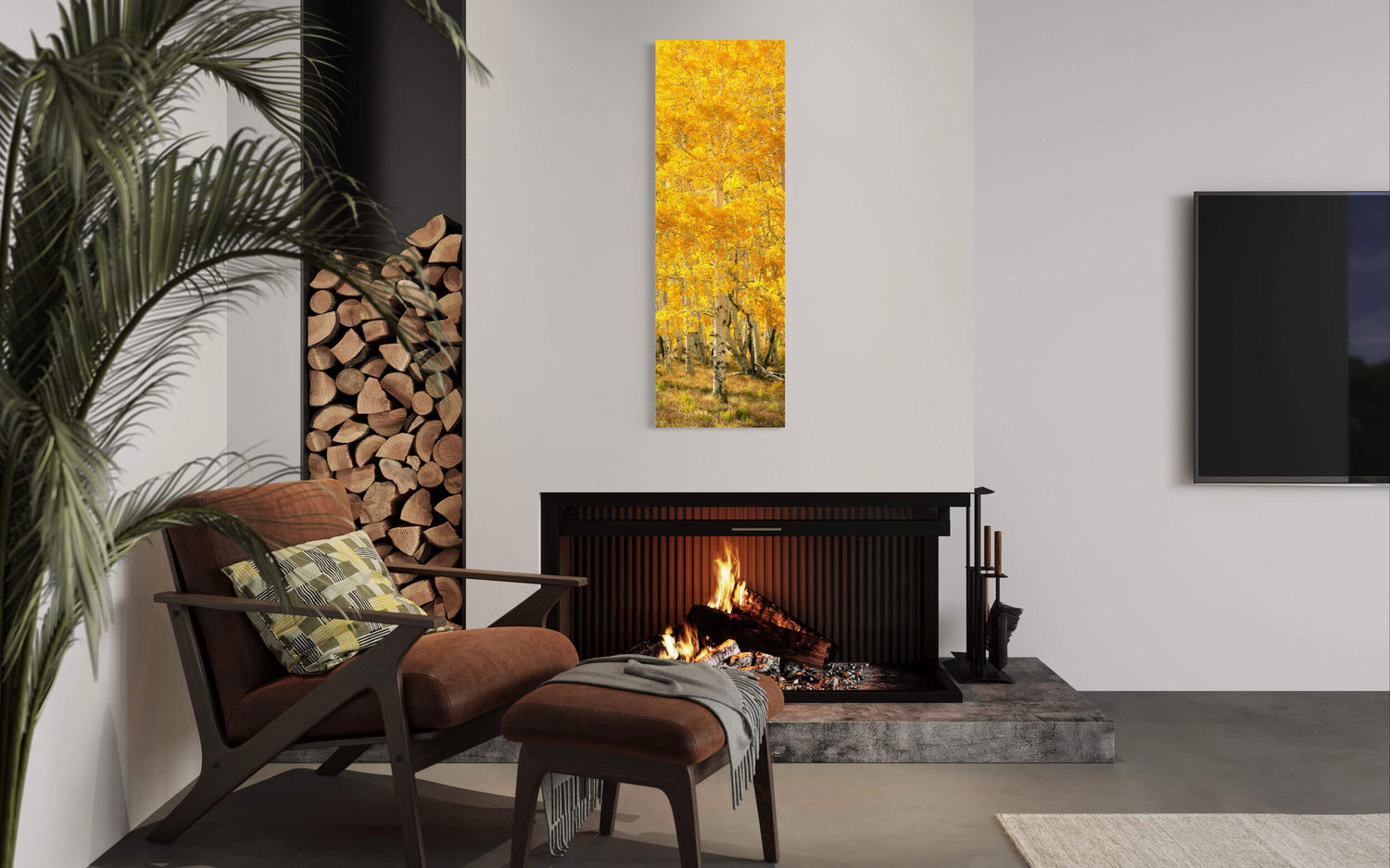 A piece of Telluride art showing an aspen tree during fall in Telluride hangs in a living room.
