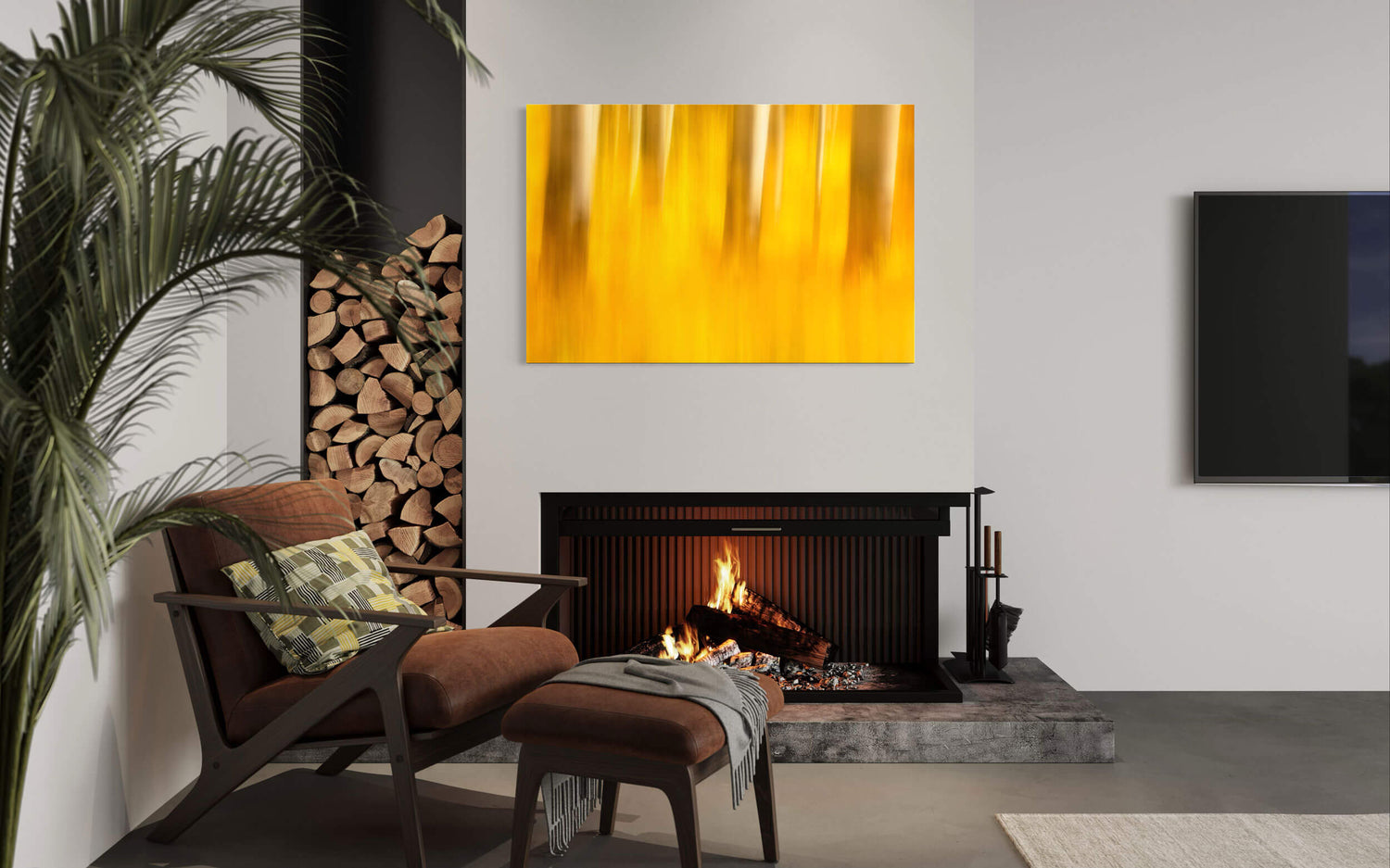 A piece of abstract Telluride art showing the fall colors on Last Dollar Road hangs in a living room.