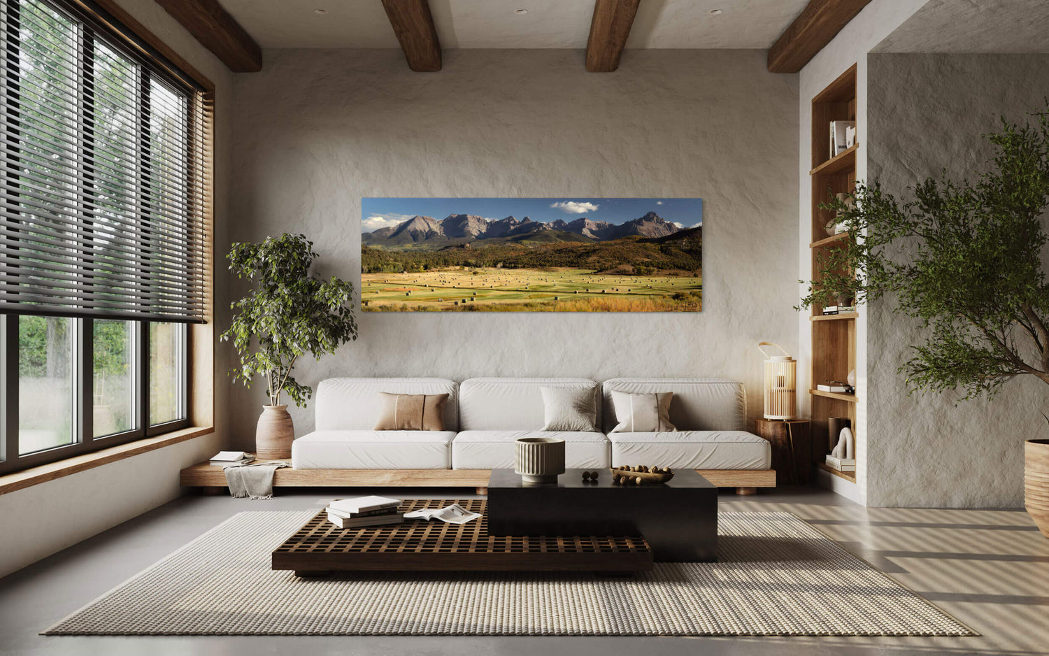 A piece of Telluride art showing the Ralph Lauren Ranch hangs in a living room.